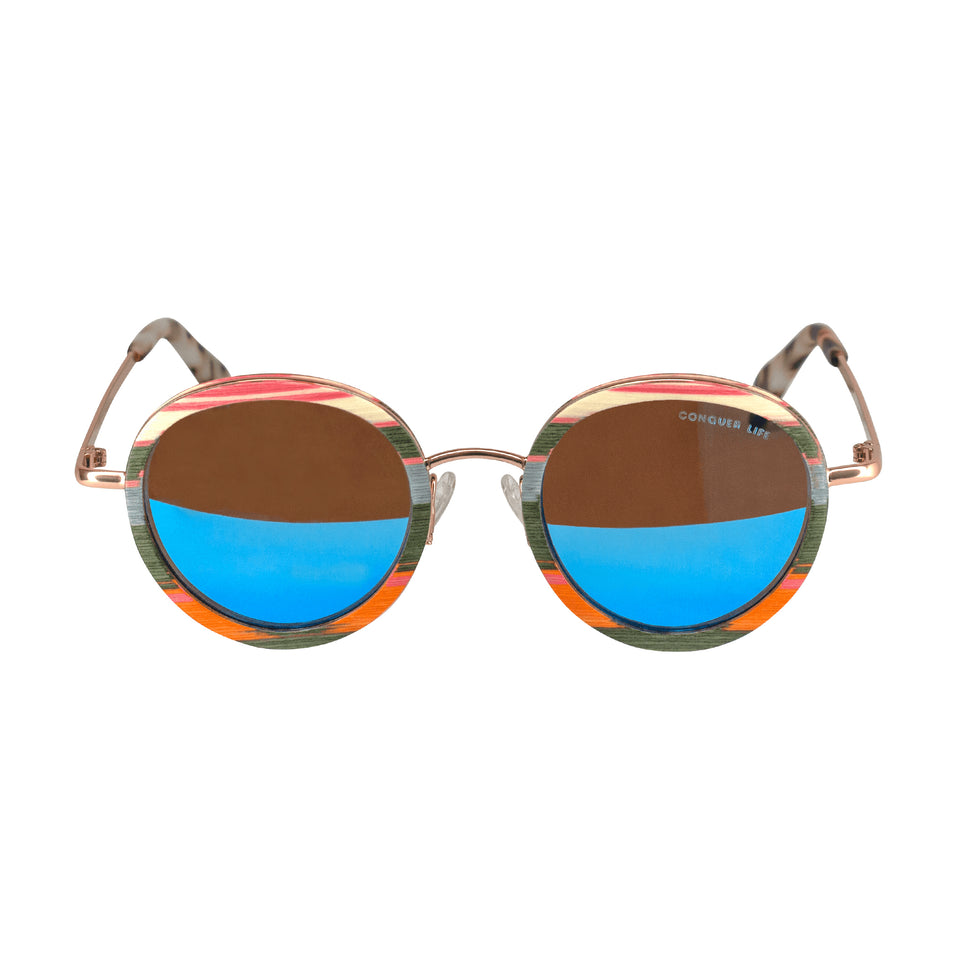 Front sunglasses with layered wood stripes dyed cream, pink, blue, green, orange: mirror lenses with Conquer Life in corner