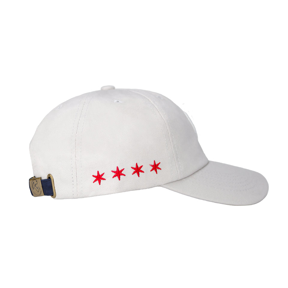 Right side of light gray cotton-nylon baseball cap, horizontal line of 4 red embroidered 6-point stars, rear bronze hinge
