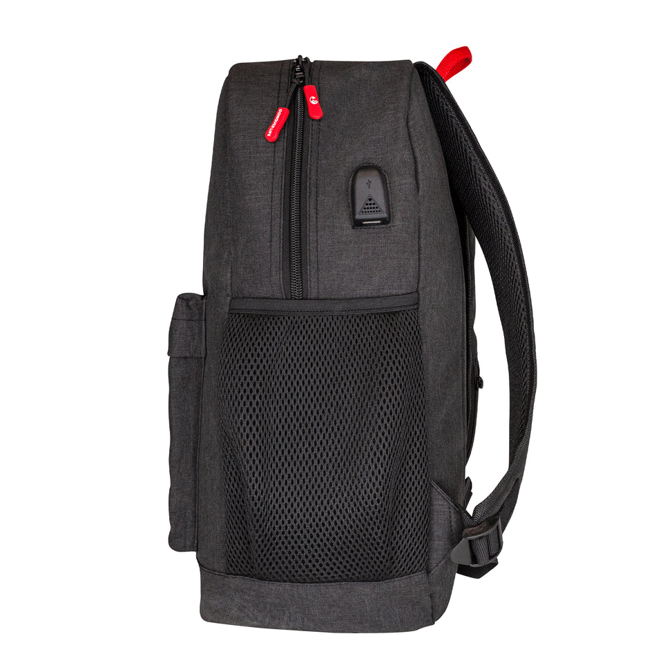 Side view of slim poly-fabric backpack in black: open mesh side pocket below black plastic USB port, padded mesh straps