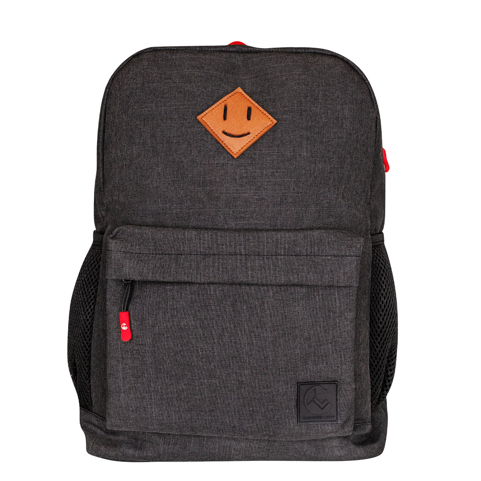 Front view of slim poly-fabric backpack in black: brown faux-leather smile patch, zipper pocket with red rubber pull