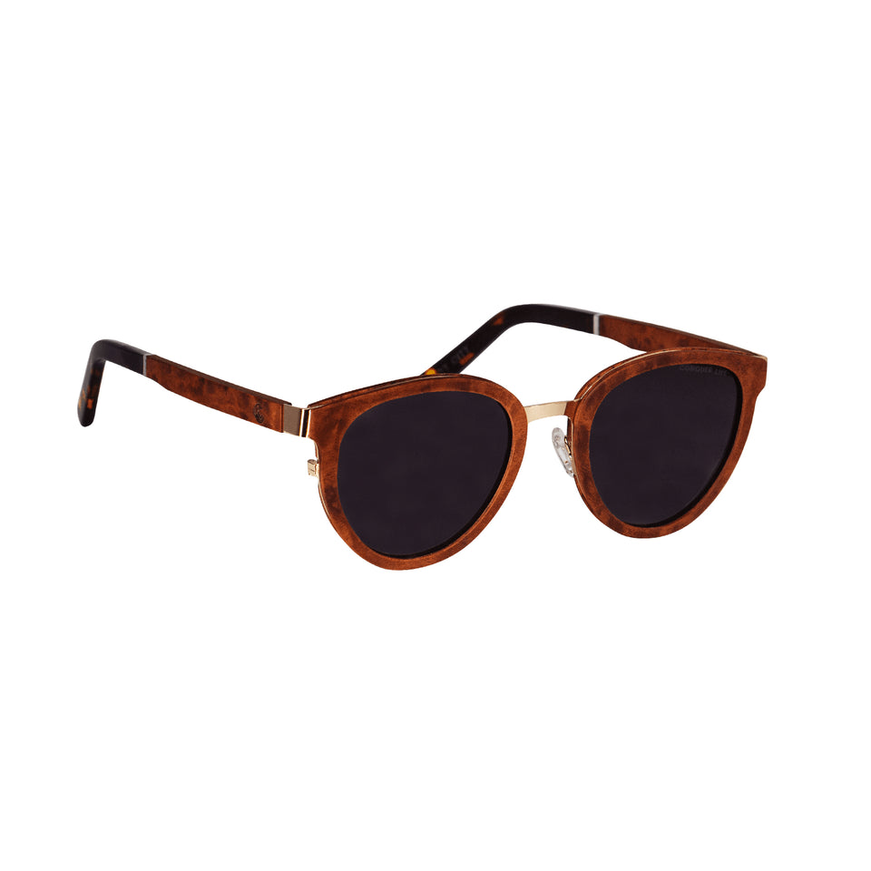 3/4 front brown wood sunglasses: wood arms & tortoiseshell acetate tips, dark non-mirror lenses
